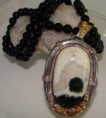 /album/joalheria/a3%20-%20rocha%20ornamental%20lapidada%20em%20caboch%c3%a3o-jpg/